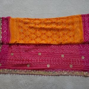 Orange and pink bandhani sari